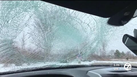 Ice flies off semitruck on I-69, damaging nearby vehicle