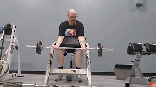 Straight barbell preacher curl. 65 lbs for 8 reps.