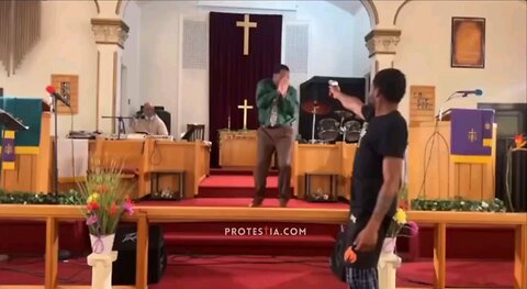 shooter try to take out the priest but his gun jams