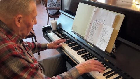 94-year-old piano player donates his time playing for other seniors