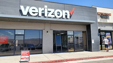 Vehicle backs into Verizon store