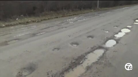 Pothole-riddled road damaging vehicles, disrupting traffic in Flat Rock, neighbors say