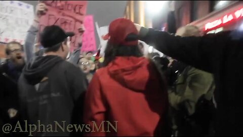 Oct 10 Minnesota 2019 trump rally 1.7 leftist mob surrounds trump supporters and steals hat