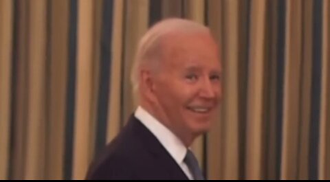 Biden smiles insidiously at the camera when asked about Trump's ‘political prisoner’ comment