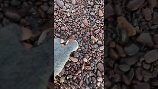 Mini rock hunt on windy Lake Superior