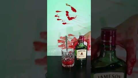Delicious spicy Halloween cocktail with strawberry