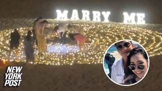 The groom-to-be loses engagement ring in the sand