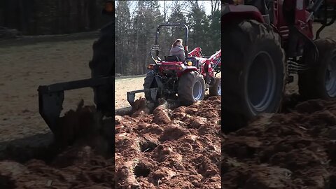 Tractor Plowing Field