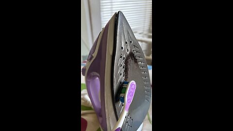Cleaning gunk off an iron