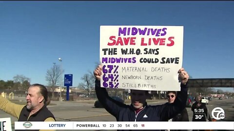 People rally over hospital's decision to end midwifery services