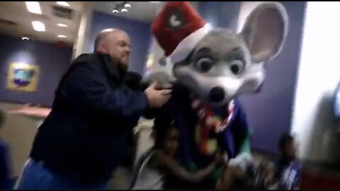 Going in for HUG on the ChuckECheese Mouse Mascot