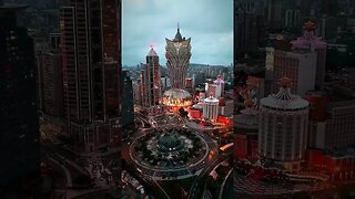 The Grand Lisboa Macau Casino Hotel, a grandiose skyscraper with 58 floors and a height of 260 m...