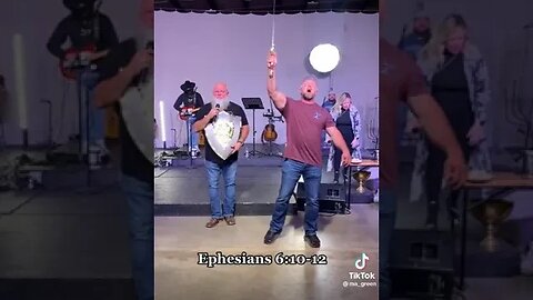 Christian Man Swings Sword on Stage and Speaks in Tongues During Worship