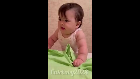 cute baby try to not laugh