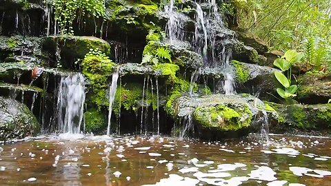 Water flows across the rocks,the beauty seems to make time stop....