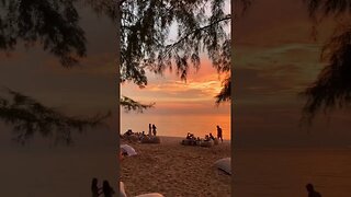 Bright sunset on a cozy evening beach in Phuket