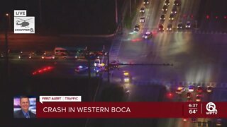 Vehicle lands in canal after crash in western Boca Raton