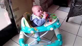 Cute Baby Boy In Car Walking Ring Blowing Toy Whistle