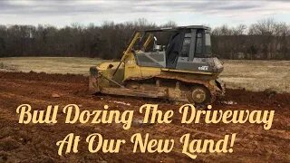 Land improvements begin! Komatsu Dozer pushes dirt and trees to make way for a new driveway