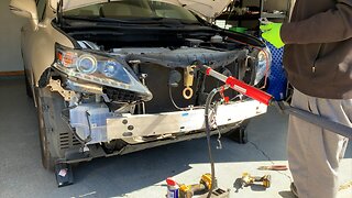 MY BUDDY PULLED THE RADIATOR SUPPORT & GOT THE HOOD LINED BACK UP ON MY LEXUS RX350 FROM COPART!