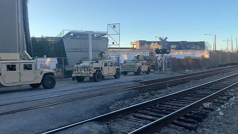 GSP and Ga Army National Guard shuttling vehicles into Staging area ahead of possible Riots