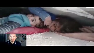 Little syrian girl and her baby brother found in rubble alive -she is protecting her baby brother