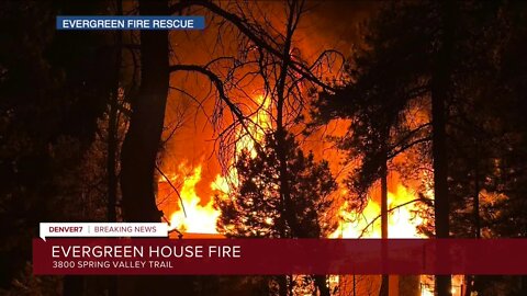 Alert sent to nearby residents as vacant home burns in Evergreen