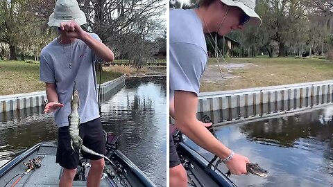 Guy in Florida catches baby alligator while fishing