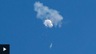 Suspected Chinese spy balloon shot down in eyewitness video