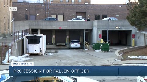 Procession for fallen officer to begin shortly