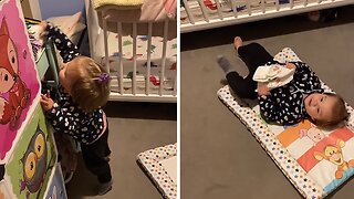 Amazing Toddler Gets Herself Ready For Diaper Change