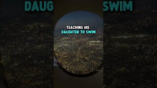 Teaching his daughter to swim