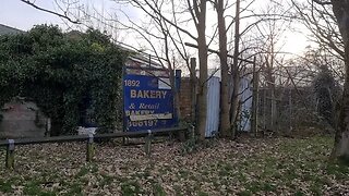 Abandoned and half burned out bakers shop with some equipment left inside.