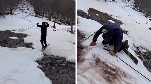 Epic Ski Fail: Guy falls face first into mud puddle