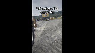 Unloading a 330 Excavator