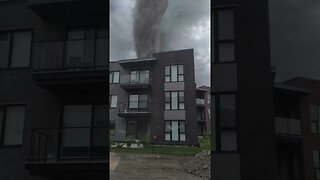 Short Tornado Behind the building