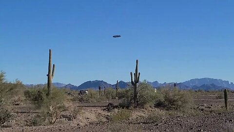 The Goodyear Blimp flies over "Healing Hearts Camp" in La Posa