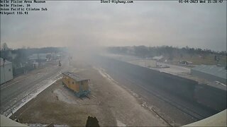 WB Empty Coal with Smokey 2nd Locomotive at Belle Plaine, IA on January 4, 2023