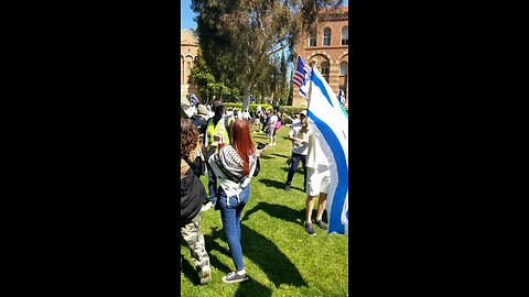 Isreali woman grabs camera and throws it as I Identify the Isreali who assaulted me earlier.