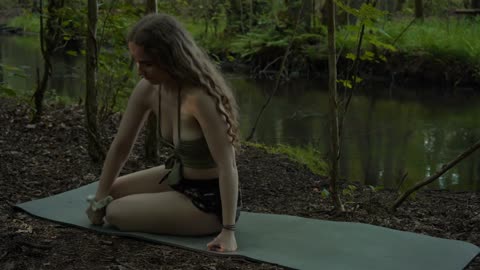 Yoga evening stretch in the forest