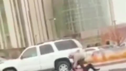 Classic Beatdown of crazy man punching random cars