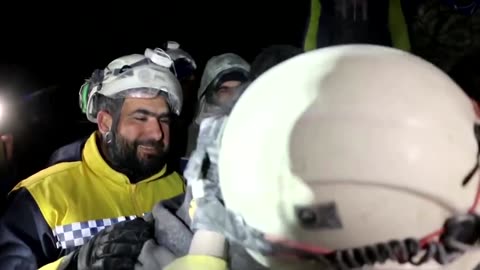 Syrian boy smiles after being pulled from quake rubble