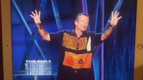 WHY WAS ROBIN WILLIAMS TALKING ABOUT BILL GATES RULING THE WORLD BACK IN 2002?