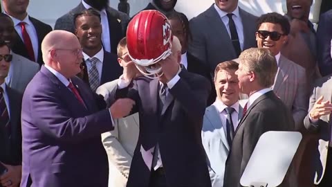 KC Chiefs' Entire Team Laughs At Biden As He Struggles To Put On Football Helmet