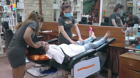 Two beautiful girls staff with excellent skills massage barbershop relaxation ASMR massage