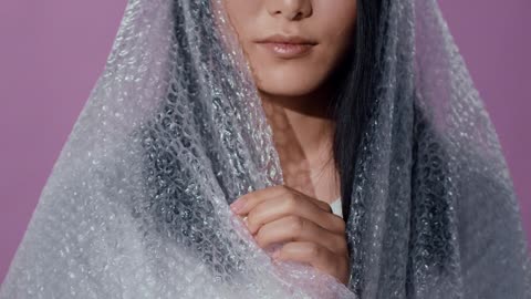 woman wrapped in bubble wrap