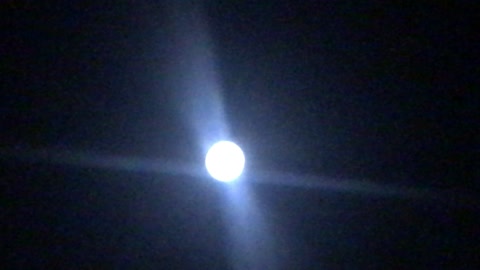 Object appears beside the moon.