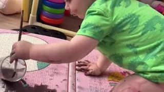 Little Girl Paints With Watercolor