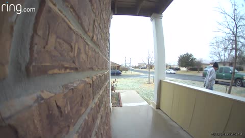 Man Slips on Slick Sidewalk