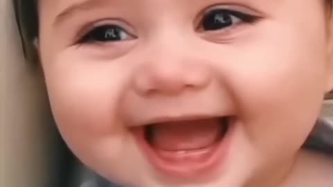 baby laughing heartily